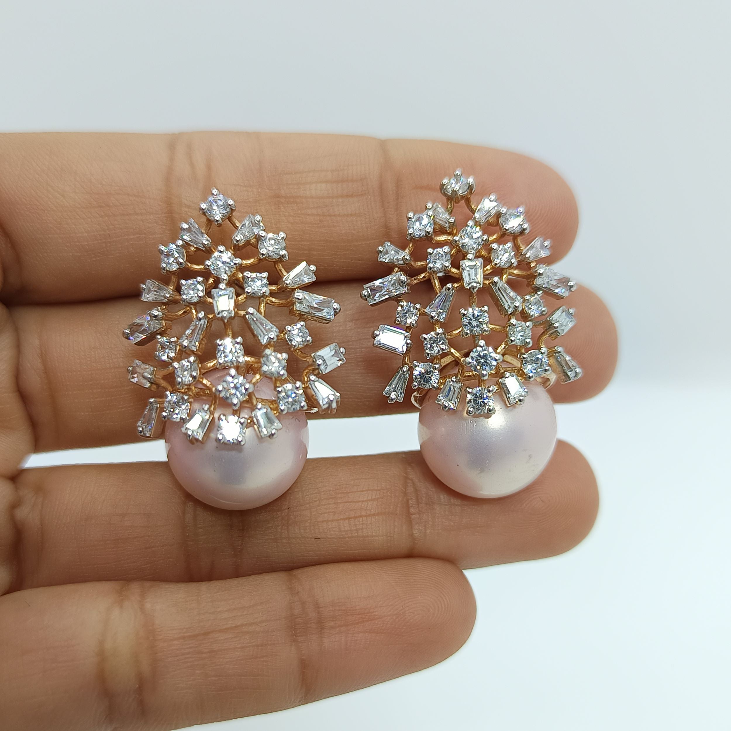 Silver Scattered Round Baguette and Tappers Zircons with Pink Pearl  Studs Earrings